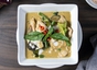 Chicken Red Curry With A Cup Of Steamed Rice
